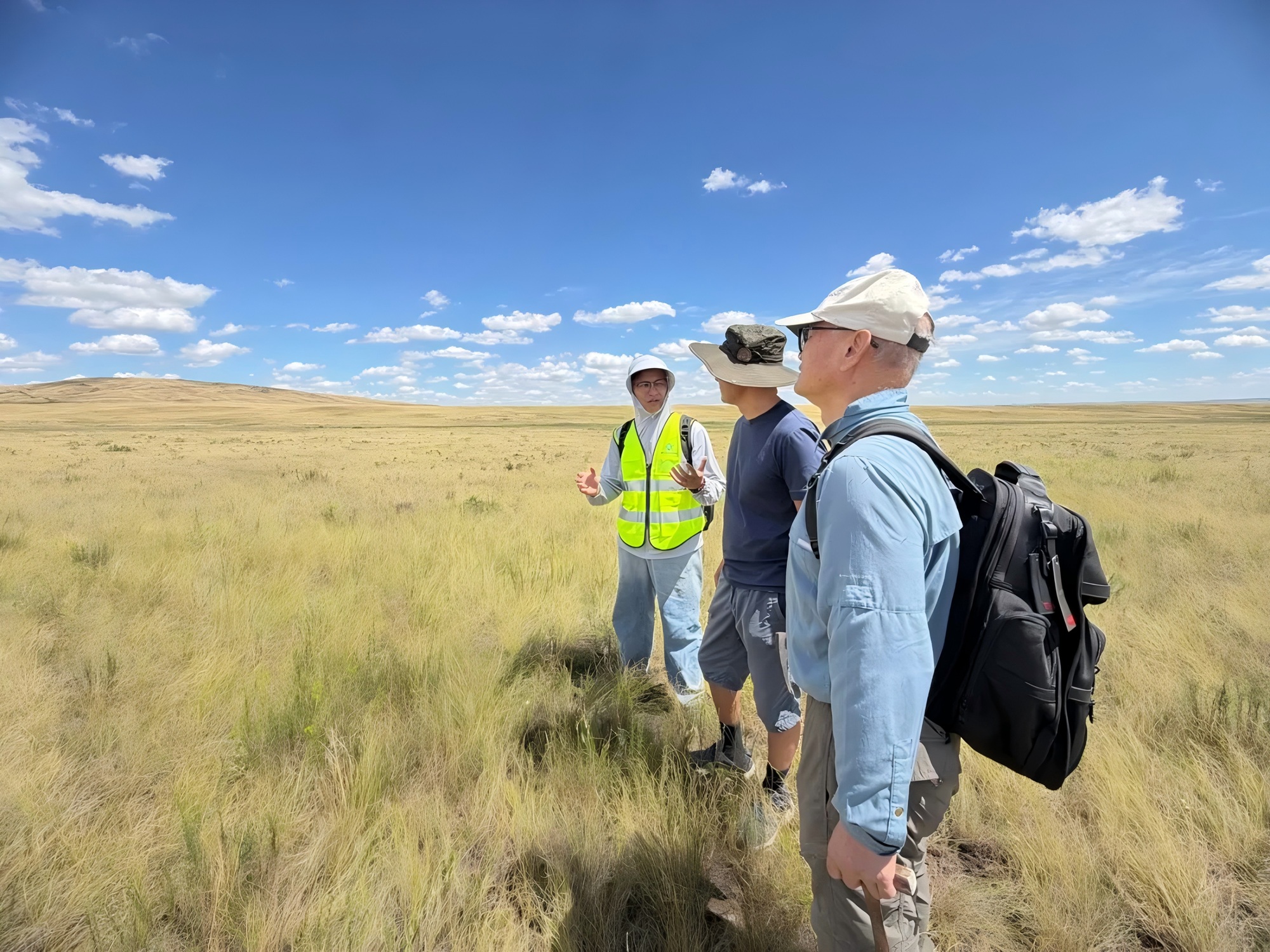The GAIA team reviews geological evidence and verification priorities in the field.